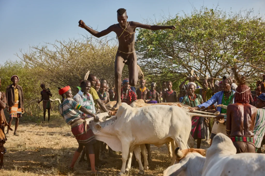 Hamar man performing bull jumping initiation ceremony in tribal Ethiopia | Michaela Pupíková Photography