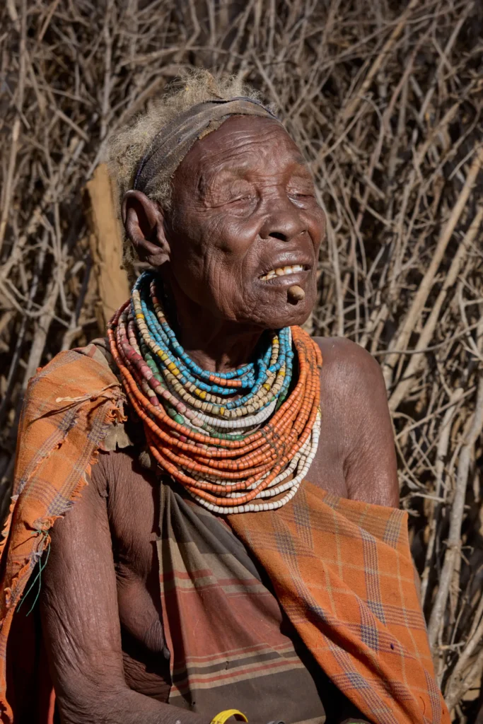 Portrait of Nyangatom elder with traditional beads and patterned cloth in tribal Ethiopia | Michaela Pupíková Photography